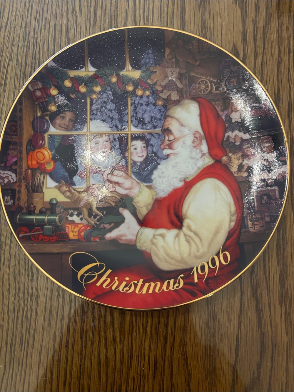 Avon 1996 Santa’s Loving Touch Christmas Plate